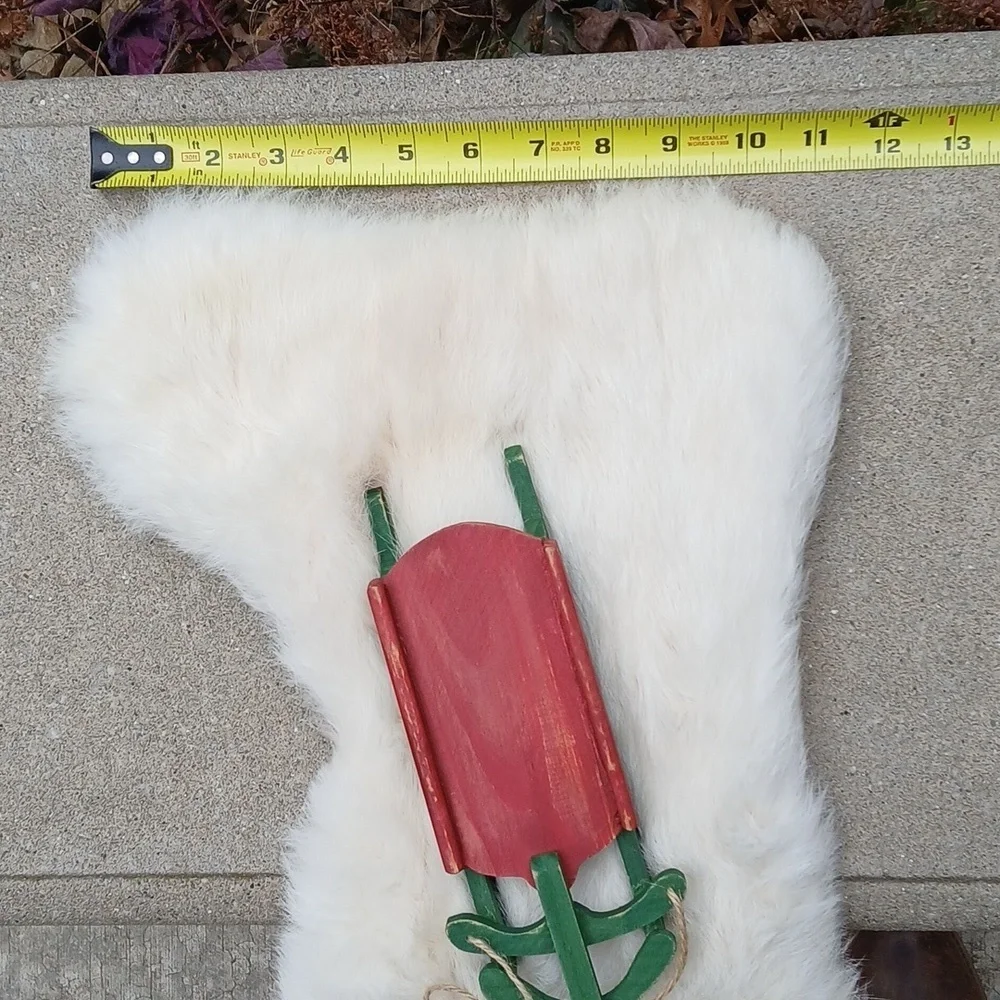White Rabbit Fur Christmas Stocking with Red and Green Sled
